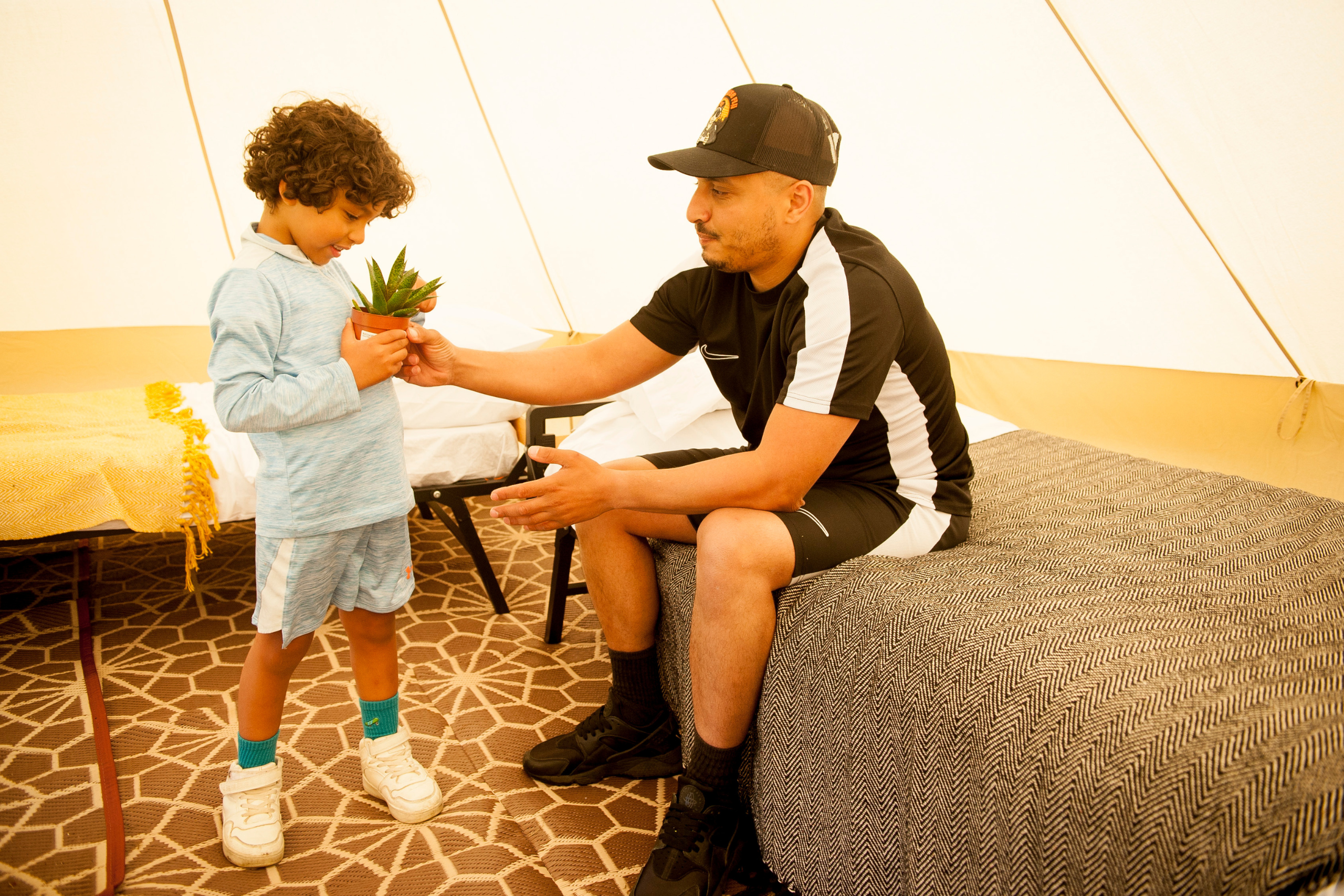 A man and his son in a Nine Yards Bell Tent